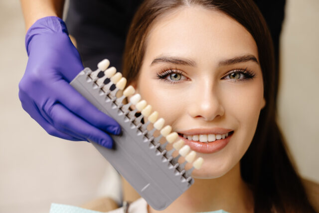 Patient smiling after affordable dental implant treatment in Istanbul clinic
